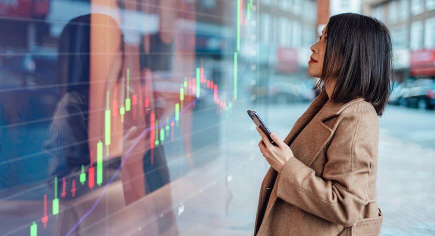 Woman looking at stock trends
